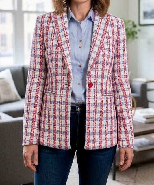 Claire Flowers cherry blossom plaid bouclé blazer in red, ivory, and soft blue tones with a tailored fit, notched lapel, and front button closure, styled over a light blue blouse and denim.