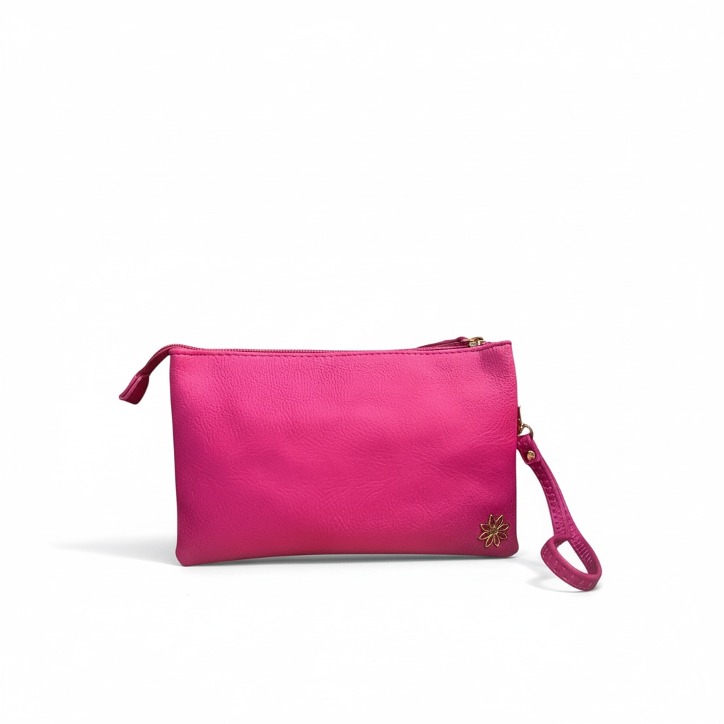 Pink Claire Flowers convertible crossbody and wristlet bag with structured silhouette, gold hardware, and detachable strap, sized approximately 9 x 6 x 2 inches. Features a zip-top closure and signature striped interior lining with one zip pocket and two open pockets, designed for everyday essentials and day-to-night wear.
